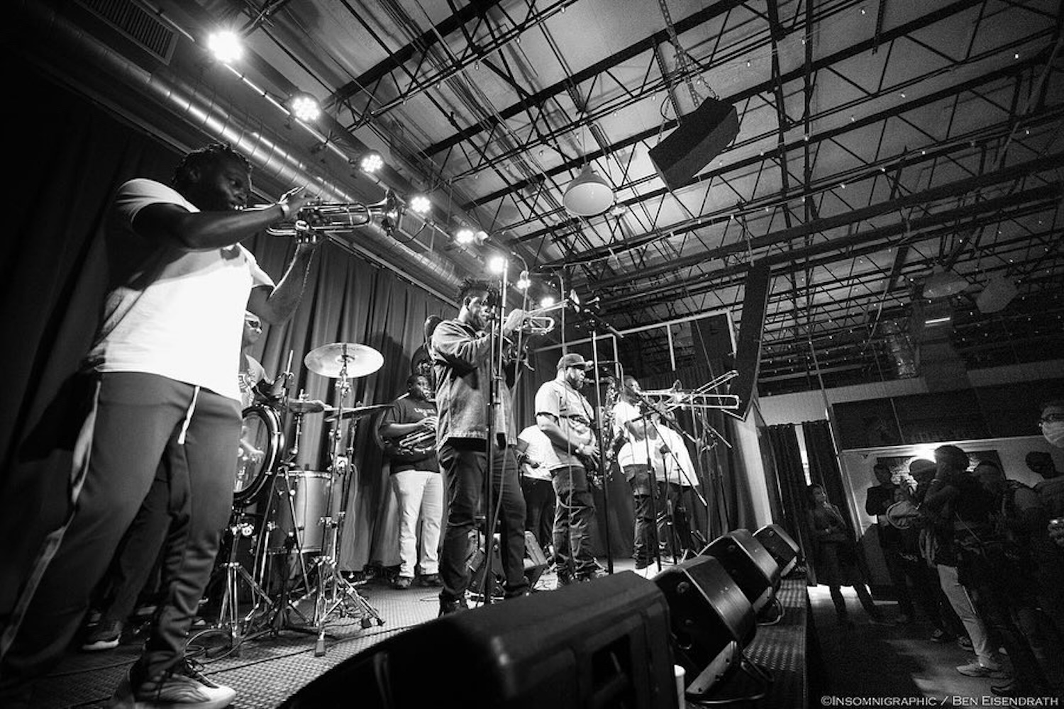 band performing, playing woodwind instruments, black and white image