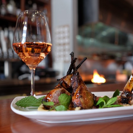 wine and plated food in the Barrel room