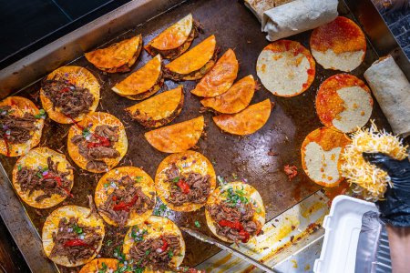 Tacos being cooked on stovetop