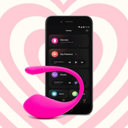 Lovense vibrator on a heart-shaped background