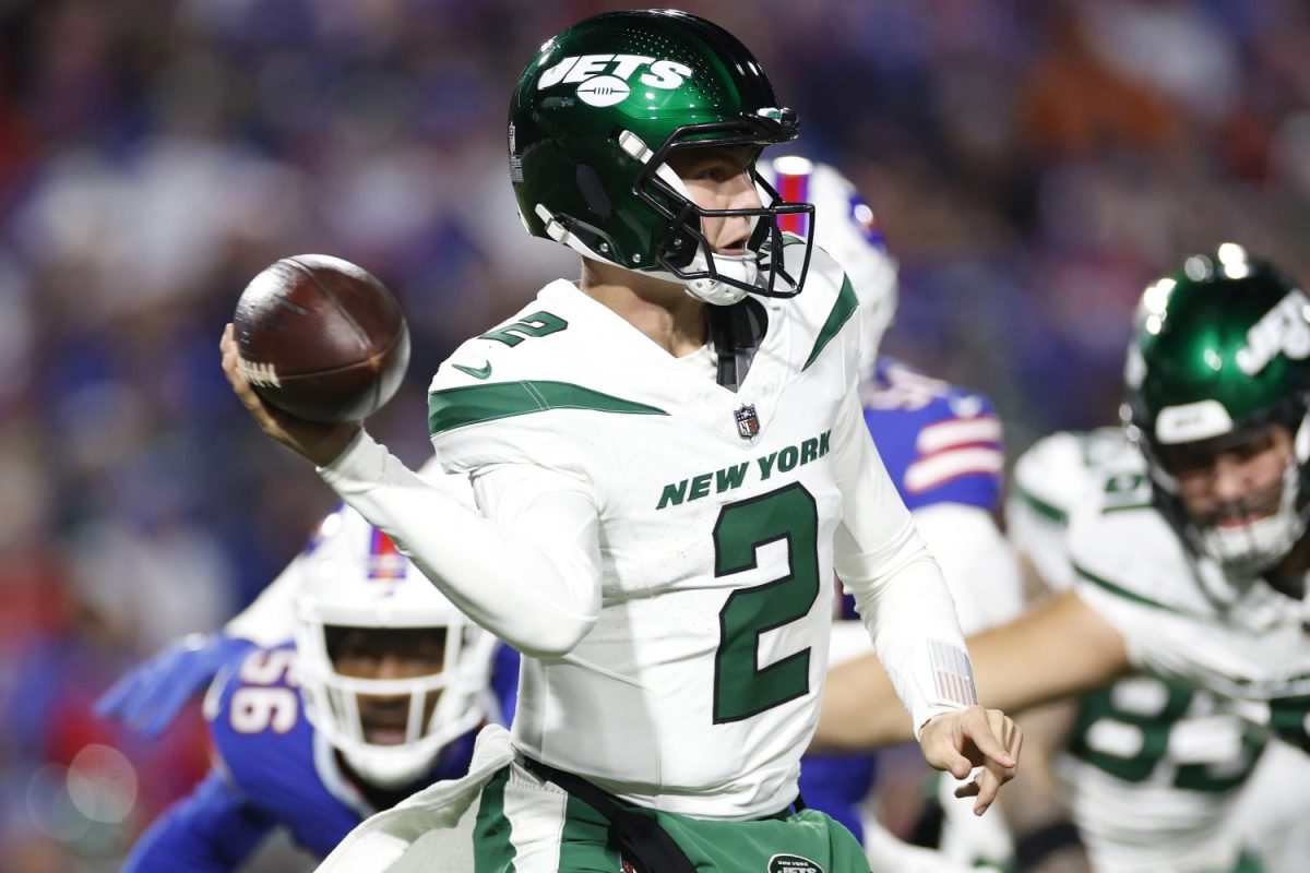 Zach Wilson throws a pass against the Bills.