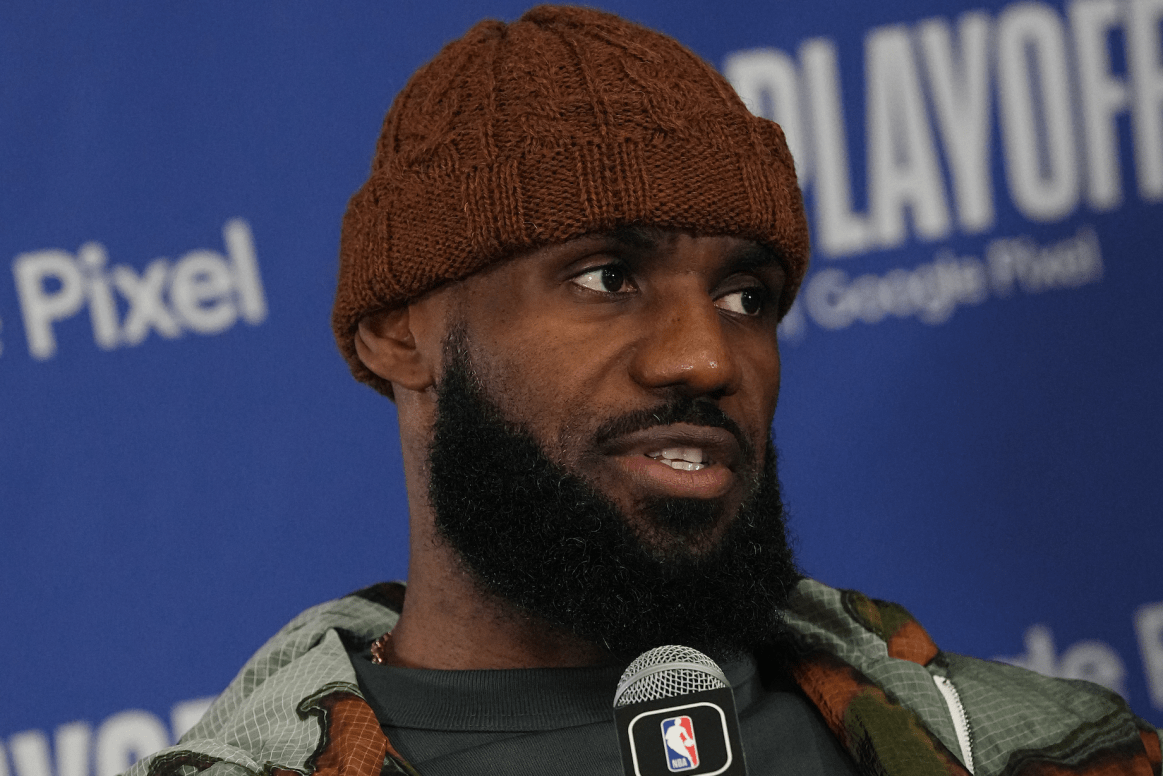 LeBron James talks to the media after losing.